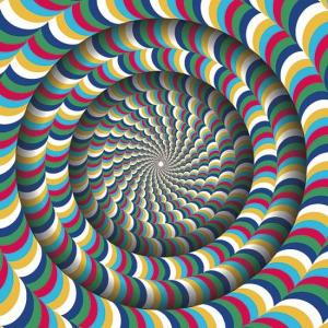 Ein Schlauch aus bunten Ringen, der sich vom Rand des Bildes in die Mitte des Bildes schlängelt. In der Mitte des Bildes ist er bereits so klein, dass nur mehr ein weißer Fleck sichtbar ist.
